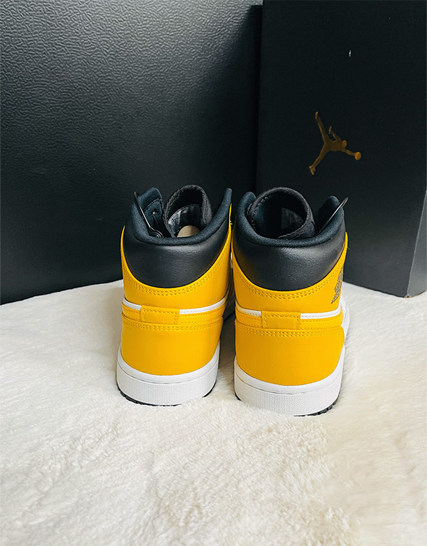 Nike Air Jordan 1 Mid “University Gold” 554724-170