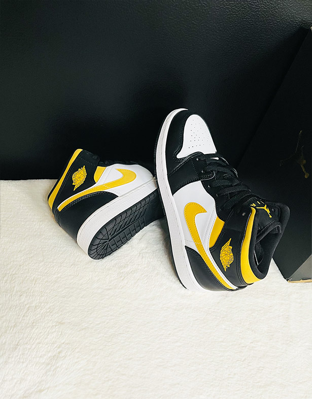 Giày Nike Air Jordan 1 Mid Gs “Black University Gold” 554725-177